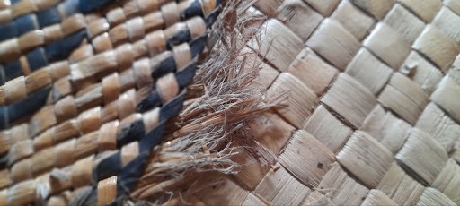 Intricate Kuta weaving (left) compared to a normal mat.
